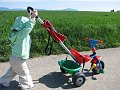 Laetitia pushing tricycle